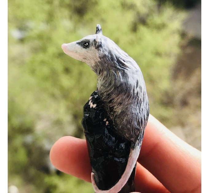 Carved wooden hair stick with Opossum