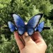 Wooden hair barrette with butterflies.