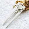 Carved wooden hair fork with crystal star