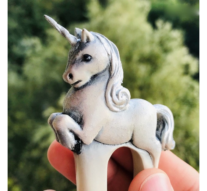 Carved wooden hair fork with white baby unicorn