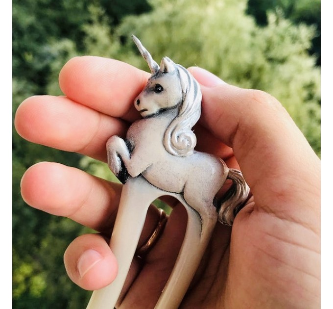 Carved wooden hair fork with white baby unicorn