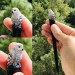 Carved wooden hair stick with snowy owl