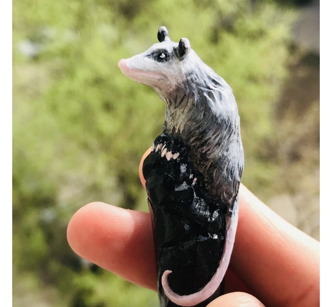 Carved wooden hair stick with Opossum