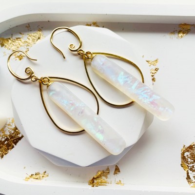 Dangle white earrings looks like opal