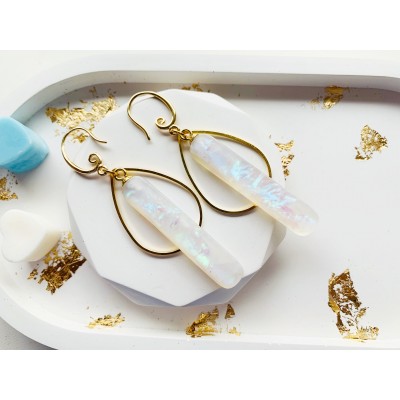 Dangle white earrings looks like opal