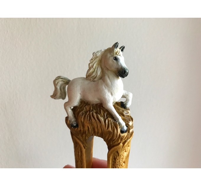 Carved wooden hair fork with white horse