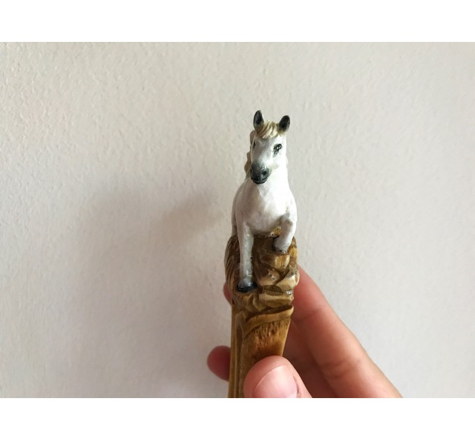 Carved wooden hair fork with white horse