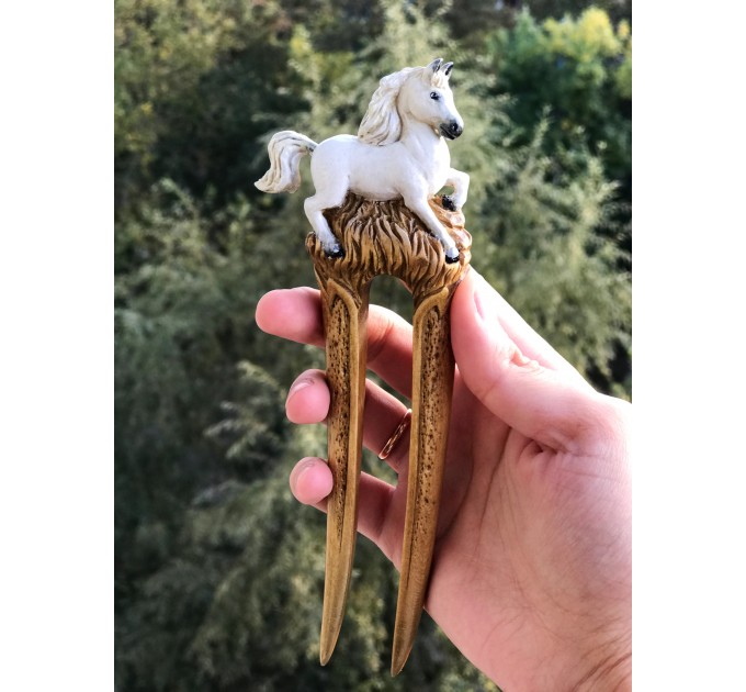 Carved wooden hair fork with white horse