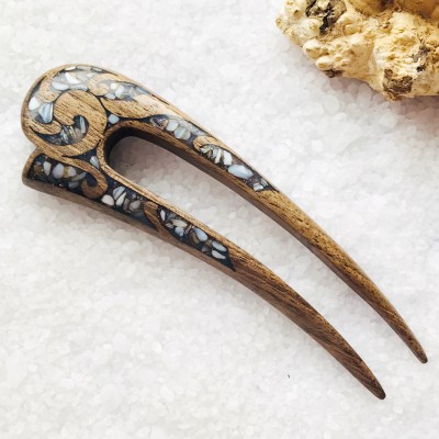 Wooden hair fork with gray stones