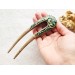 Double sided hair fork with green stones 