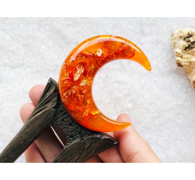 Wooden hair fork with orange crescent 